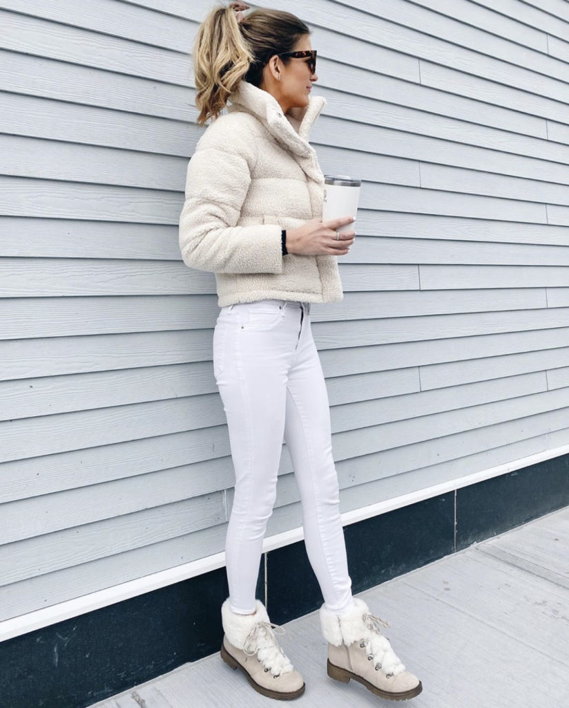abercrombie cream sherpa mini fleece puffer jacket with white skinny jeans and fur lace up boots