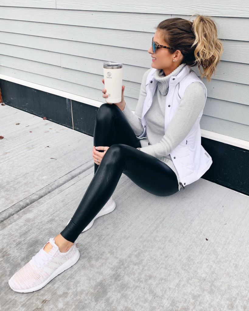 how to wear black faux leather leggings with casual athleisure wear